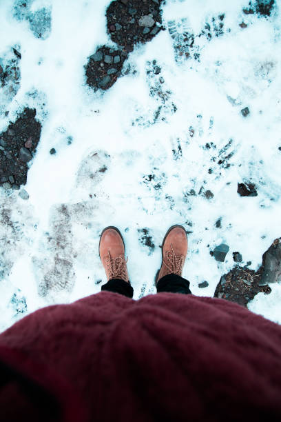 istock walking through the snow in the mountain 1246443123