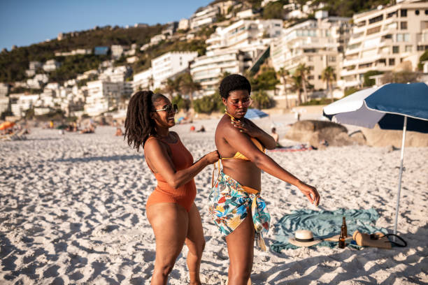 istock Putting suncream at the beach 1246447088