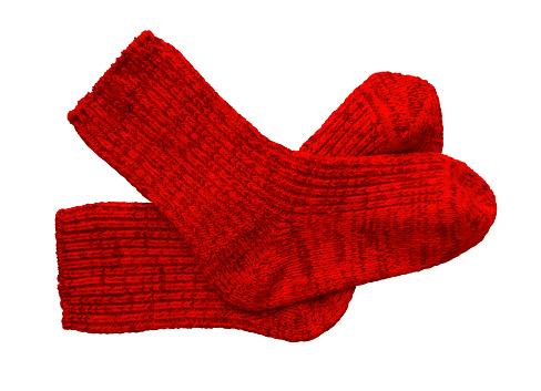 Red pair of woolen socks isolated on white background. Clipping Path included.