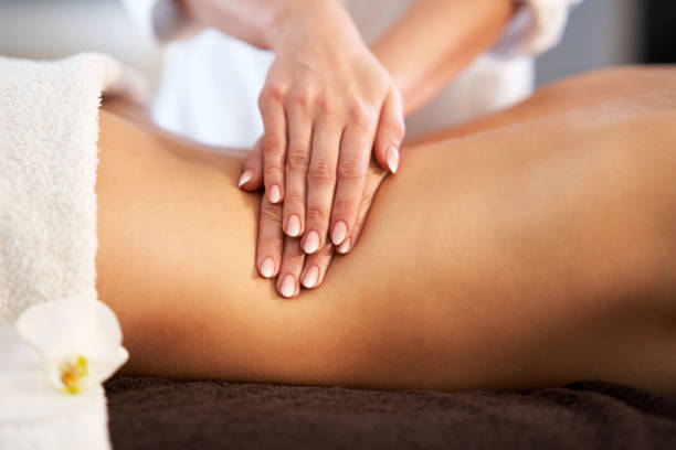 istock Relaxed woman receiving back massage 1246461666