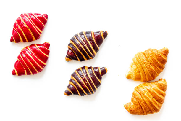 istock Croissants pattern - set of snacks on white background 1246467642