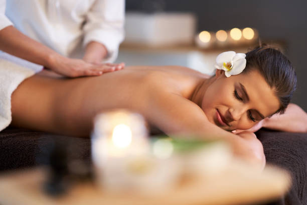 istock Relaxed woman receiving back massage 1246468333