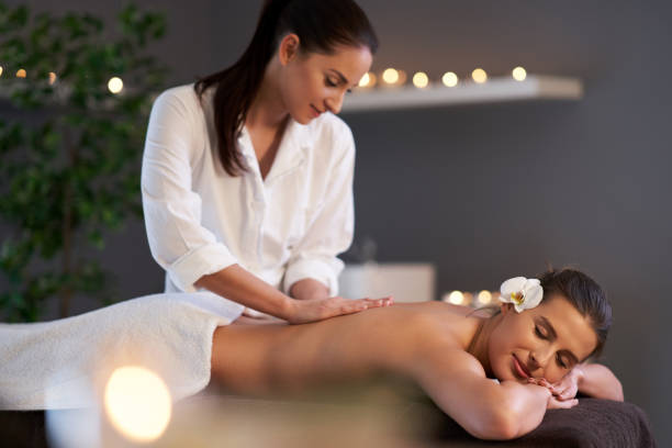 istock Relaxed woman receiving back massage 1246468393