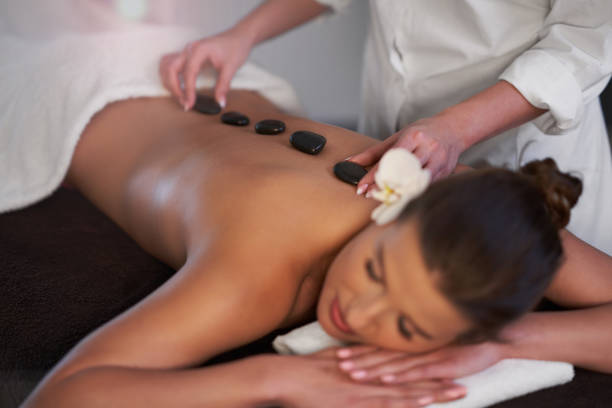 istock Relaxed woman receiving back massage 1246468484