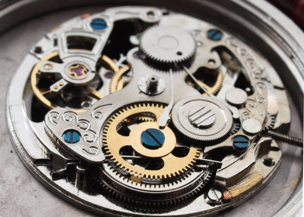 Detail of watch machinery. Old mechanical pocket watch. Macro shot.