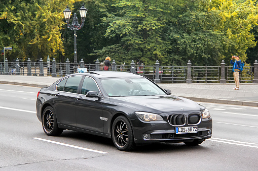 Berlin, Germany - September 12, 2013: Luxury saloon car BMW 7-series (F01) in the city street.