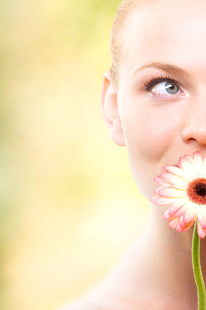 istock Close-up of beautiful face with flowers 124650109