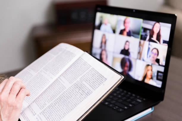 istock Unseen person joins Bible study through video conferencing 1246533904