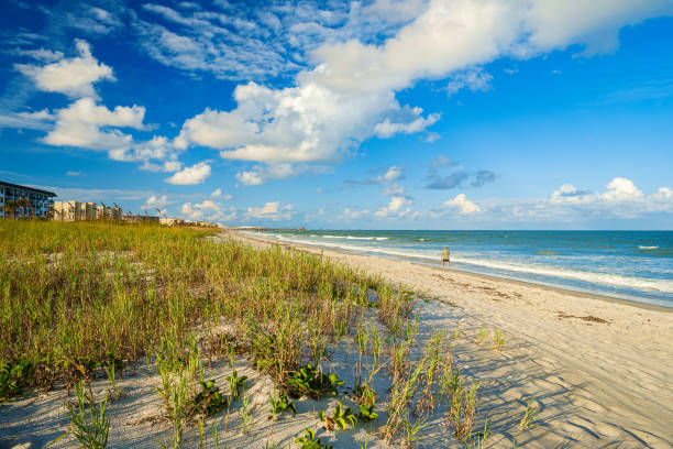 Cocoa Beach Florida Beautiful Cocoa Beach, Florida with blue sky and clouds. cocoa beach stock pictures, royalty-free photos & images