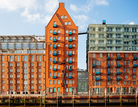 Modernized warehouse buildings on the embankment of Elbe river, Hamburg, Germany