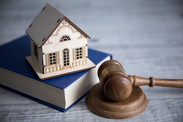house model on book with judge stock photo