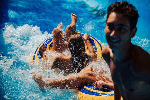 istock Happy family in water park 1246548222