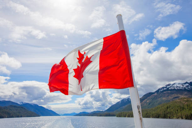 istock Canadian Flag on the Water 1246554728