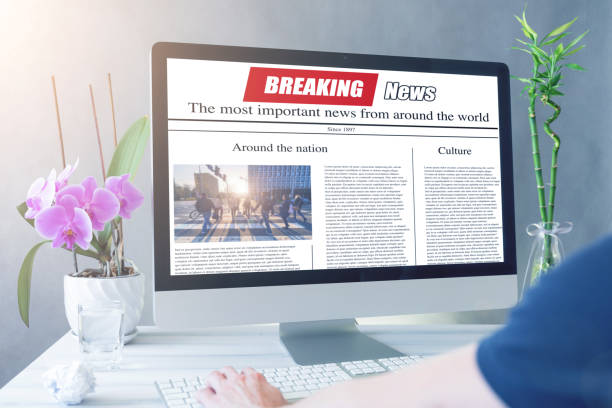 istock Men reading news on a computer screen. Mockup website. Newspaper and portal on internet 1246556062