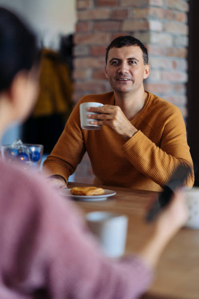 istock A couple eating pastries for breakfast 1246560026