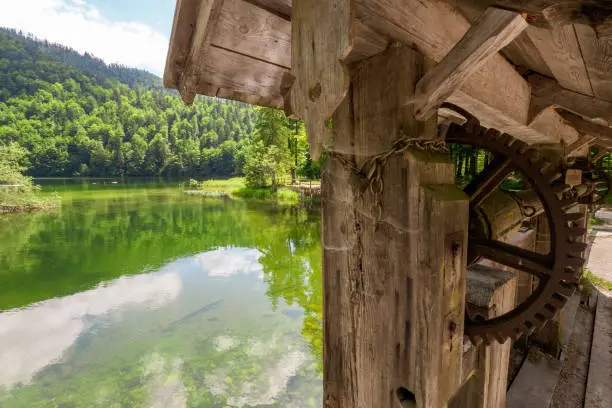 Toplitzsee, Austria - July 16th 2019: The old watergate regulates the water flow of the Toplitz river today the same way as it did in the past centuries. The Toplitz river is the only outflow of the Lake Toplitz and flows into the Lake Grundlsee.
