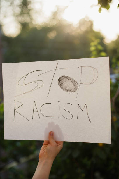 istock Woman holding white paper with text 