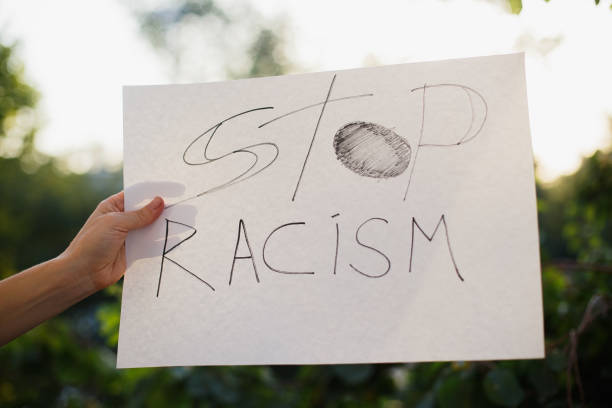 istock Woman holding white paper with text 