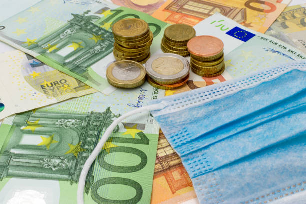 istock Euro money and coronavirus 1246574502