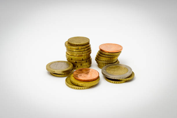 istock Euro coins on white background 1246577613