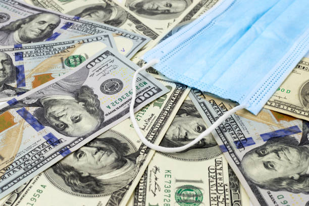 istock Dollar money and coronavirus 1246578138