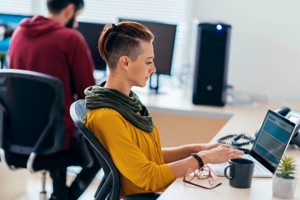 istock Businesswoman using laptop in the office 1246586498