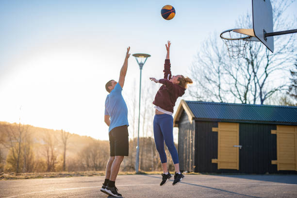 istock Friend playing basketball. 1246600616