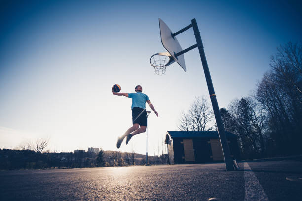 istock Young man playing basketball. 1246600698