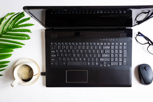 istock black laptop and girls hands 1246600803