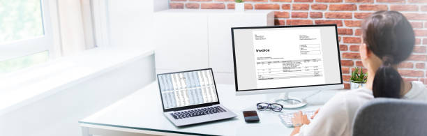 istock Young Woman Doing Online Invoice Management 1246602489
