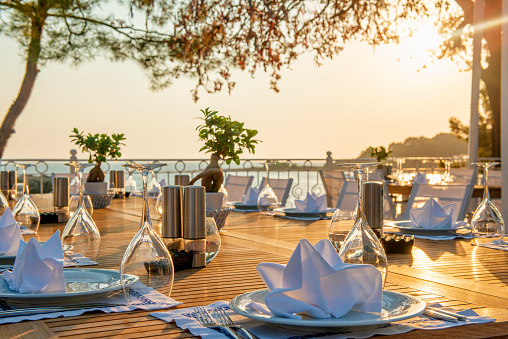 Dinning Table on SeaSide. Beautiful sunset in Antalya, Turkey.