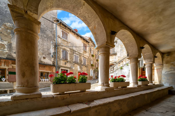istock Beautiful arcs on old authentic Istrian building in Groznjan, Croatia. 1246631118