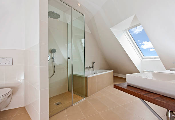 istock sunlit bathroom with roof top window 124664367