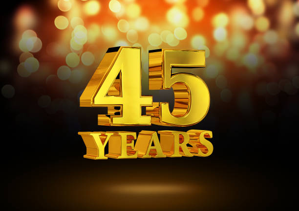 istock Anniversary 45 years gold 3D isolated on an elegant bokeh background. 1246655920