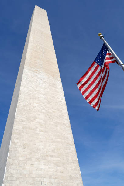 istock Washington Monument and the US flag 1246660571