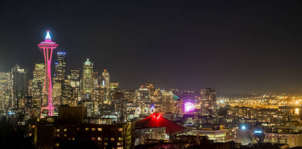 istock The Downtown Seattle Skyline with Space Needle at Night, Washington State. 1246669613