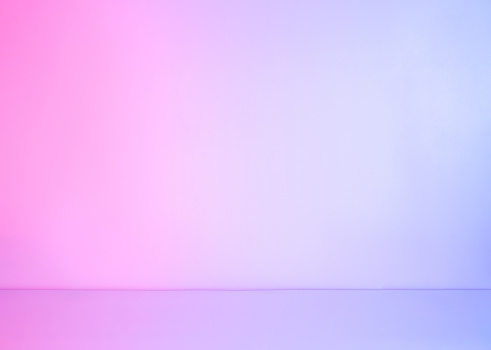 Abstract white empty background lit with colorful neon pastel light. Futuristic template with copy cpace.