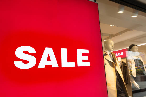 istock window display with text SALE in a shop. 1246703007