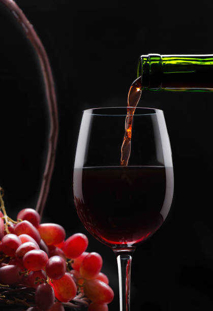 istock Wine and grapes in a basket 1246717138