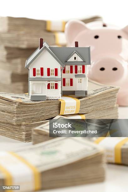 Small House And Piggy Bank With Stacks Money Stock Photo - Download Image Now - Business, Coin Bank, Color Image