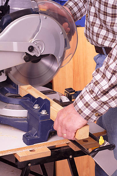 istock Man sawing wood 124671822