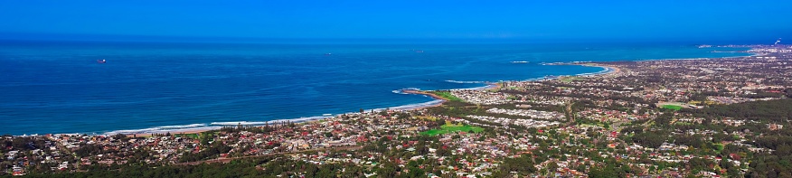 Panoramic view of Wollongong Sydney Australia from Bulli Lookout on a sunny winters day blue skies