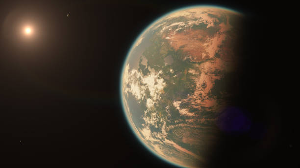 istock Alien Earth Like Exoplanet with Moons Orbiting Star in Space 1246765114