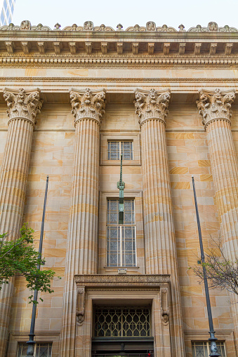 Masonic temple with architectural detail of marble steps and ionic order columns, Brisbane, Australia.