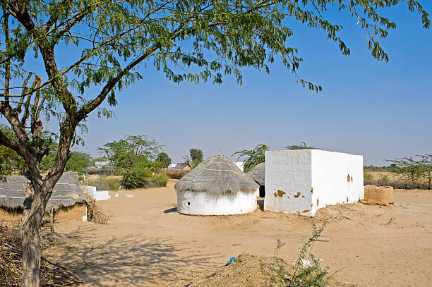 istock White hut under blue sky in small desert village 124682709