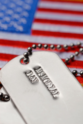 Stock Photo of Memorial Day dog tags and flag patch.