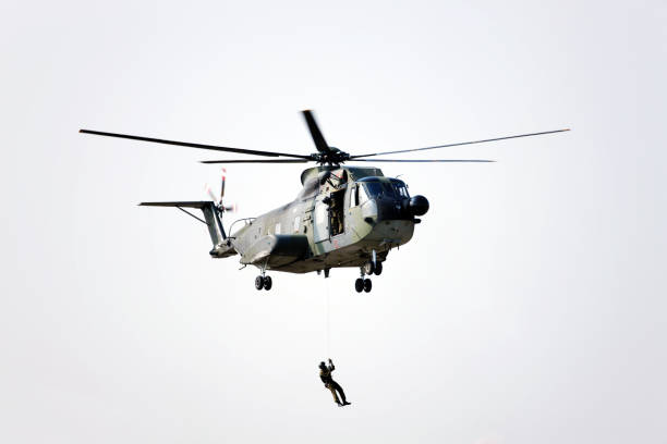 istock Military Helicopter with Marines. Color Image 124685177