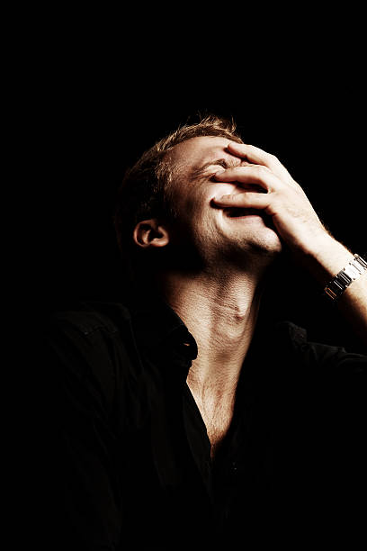 istock Despair Male Beauty Portrait with Black Background 124685557