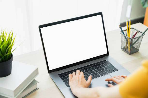 istock Mock up of woman hand using laptop and touching keyboard. 1246863905