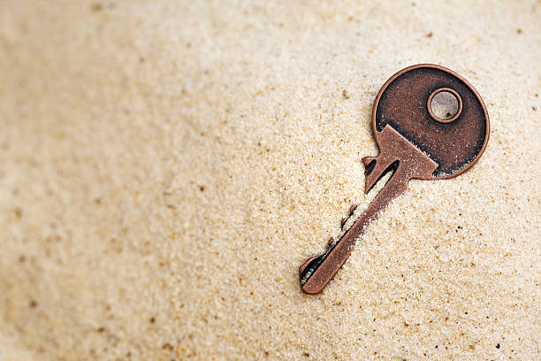 Key In Sand 110+ Lost Keys In Sand Stock Photos, Pictures & Royalty-Free Images ...